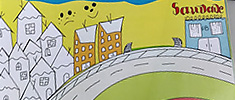 Recorte da capa da cartilha com fundo verde, desenho infantilizado de silhueta de uma cidade com casas, prédios e uma rua curva. Recorte da capa da cartilha com fundo verde, desenho infantilizado de silhueta de uma cidade com casas, prédios e uma rua curva.